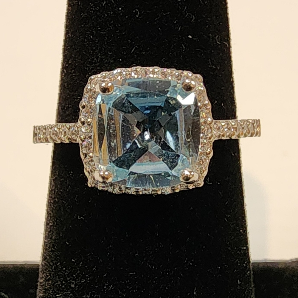 Sterling Silver Ring With Blue Topaz And CZ's NWOT